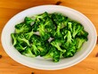 Step-by-step preparation of broccoli with cheese on a wooden table preparation of the necessary ingredients, top view
