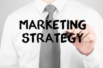 Poster - Businessman writing word Marketing Strategy with marker, Business concept