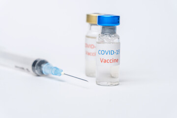 Covid-19 Corona Virus 2019-ncov vaccine vials medicine drug bottles syringe injection. Vaccination, immunization, treatment to cure Covid 19 Corona Virus infection. Healthcare And Medical concept.