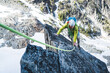 © Cavan Images - Rock climbing man climbing on mountain in Washington with rope