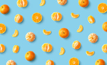 Colorful Fruit Pattern Of Fresh Mandarin Tangerine Or Clementine On Blue Background