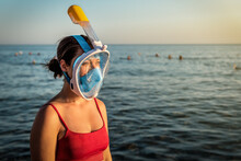 Woman In Full-face Snorkeling Mask