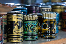 Burmese Cigars In Colorful Painted Containers On Display In Cheroot Workshop, Lake Inle, Myanmar