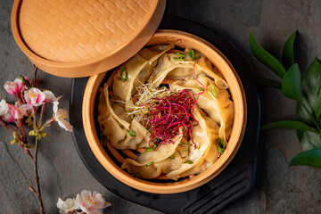 Wall Mural - Gyoza Fried Dumplings in a Round Box