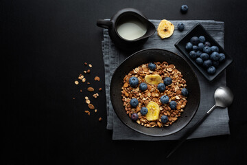 Wall Mural - Muesli with berries and fruits in bowl