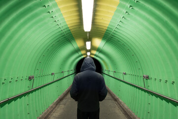 Poster - Silhouette of men standing at end of tunnel