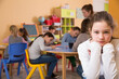 © JackF - Portrait of schoolgirl and children drawing in classroom