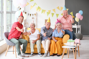 Wall Mural - Senior people celebrating Birthday at home