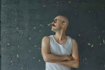 Wall Mural - unusual portrait of a bald mustachioed young gentleman, eccentric mister, psychology concept