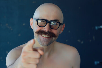 Wall Mural - unusual portrait of a bald mustachioed young gentleman, eccentric mister, psychology concept