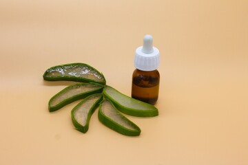 Wall Mural - organic aloe vera plant with glass jar with aloe vera oil