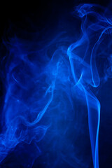 Blue smoke motion on black background.