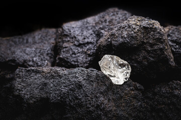 Canvas Print - Rough diamond, uncut gemstone, mine bottom. Concept of mining and extraction of rare ores.