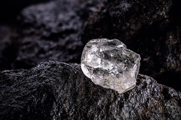 Poster - large uncut diamond stone in a natural state within a mine. Concept of beauty, luxury and rare jewel