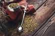 Composition with yerba mate tea on wooden table