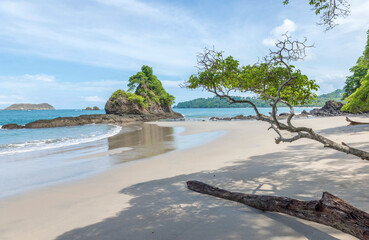 Wall Mural - Manuel Antonio beatiful tropical beach with white sand and blue ocean. Paradise. National Park in Costa Rica, Central America.