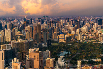 Modern Skyscraper of business center district at Bangkok skyline with sunset sky background, Bangkok city is modern metropolis and favorite of tourists of Thailand