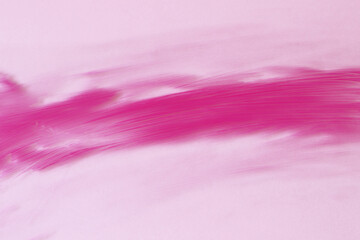 smooth pink colour brush stroke on pink background