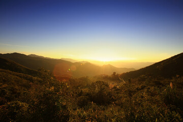 Wall Mural - Beautiful fist sunrise in the morning over the mountain, beautiful mountain view