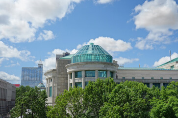 Wall Mural - Raleigh NC skyline with the Museum of Natural Sciences glass dome in the foreground