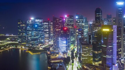 Wall Mural - SINGAPORE - FEBRUARY 2: Hyper lapse Aerial drone view of Singapore business district and city, Marina Bay is bay located in the Central Area of Singapore on February 2, 2020 in Singapore.