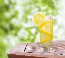 Poster - Lemonade with fresh slice lemon on desk