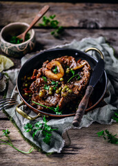 Canvas Print - Veal ossobucco with green peas.selective focus