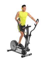 Canvas Print - Man using modern elliptical machine on white background