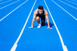© Tom Wang - Male  athlete on  race track is ready to run
