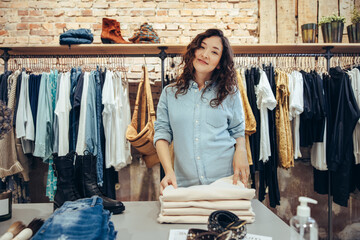 Canvas Print - Portrait of a clothing store saleswoman