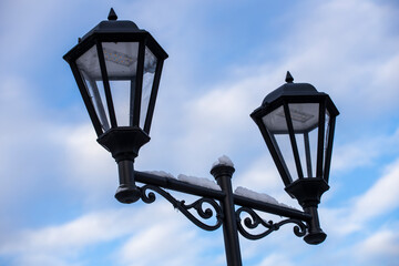 Poster - street lamp on the background of the sky with clouds