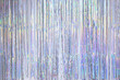 Silver foil tinsel strips. Festive or Christmas decoration background