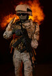 a soldier on fire holding a gun. Fight against terrorism