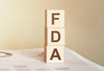 Poster - word fda made with wood building blocks