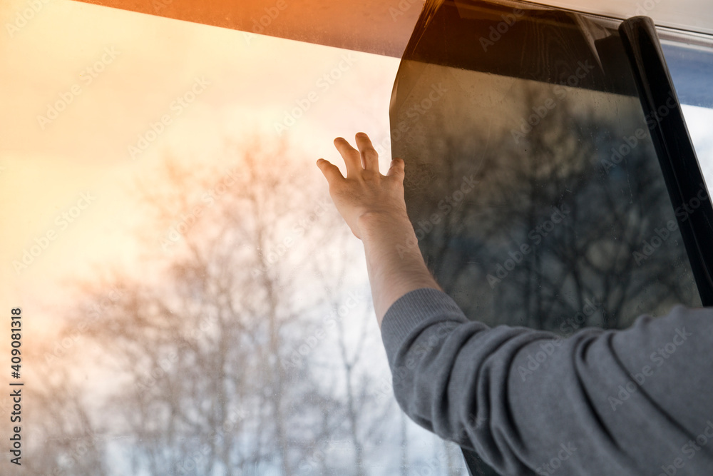 Installation of window film in the office. Protection from ultraviolet radiation.