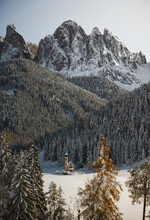 Val DI Funes During Winter With Dolomites Mountains In The Background