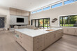 © Cavan Images - Spacious Kitchen and Living Room in New Contemporary Style Luxury Home