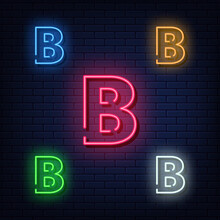 Neon Letters, Five Colors Red, Blue, Green, Yellow, White. Isolated Font On Dark Blue Brick Wall Background. Vector Illustration Eps 10.