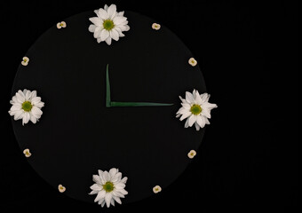 Flower Clock On Black Background