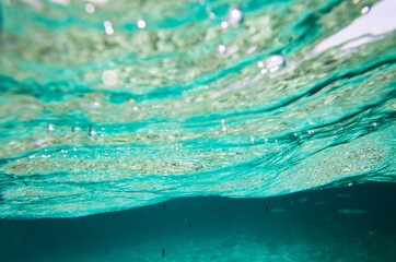 Surface of the sea from under the water, background