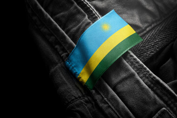 Tag on dark clothing in the form of the flag of the Rwanda