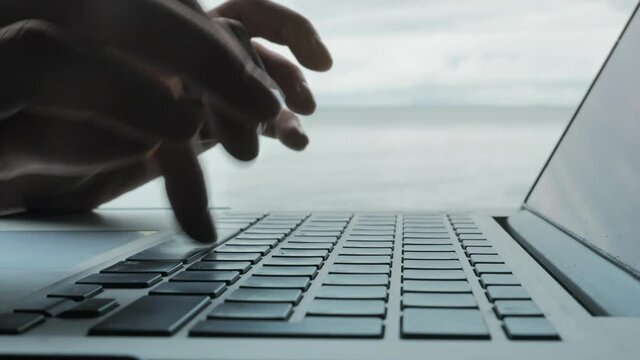 Fototapete - Female hands opening and closing laptop after work. Freelance outdoor work concept