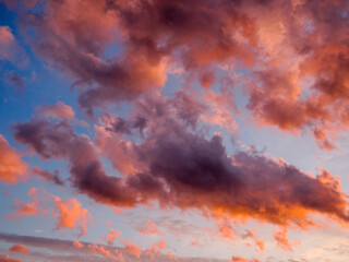 red clouds over blue sky