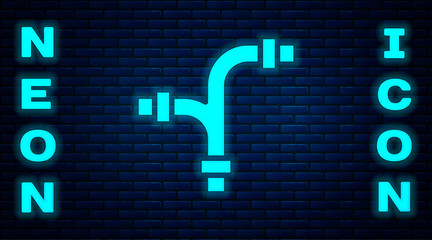 Sticker - Glowing neon Industry metallic pipe icon isolated on brick wall background. Plumbing pipeline parts of different shapes. Vector.