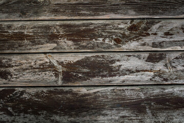 Wooden background from dry old boards with scratches