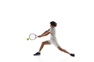 Achievement. Young caucasian professional sportsman playing tennis isolated on white background. Training, practicing in motion, action. Power and energy. Movement, ad, sport, healthy lifestyle