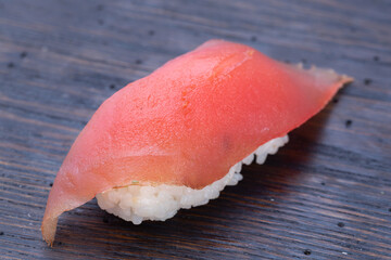 Set Nigiri sushi set with tuna, salmon, prawns, sea bass. sushi nigiri collection on Black background, reflection, high resolution