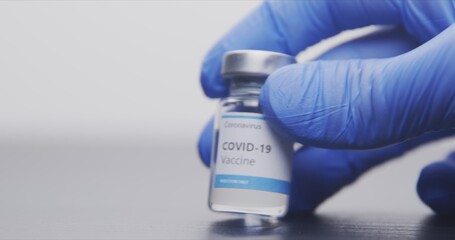 Vaccine in human hands closeup footage