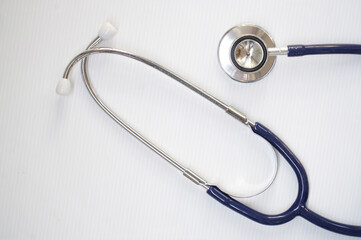 Stethoscope blue on white background.