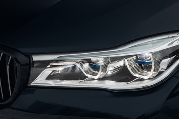 Poster - The headlight of modern and luxury car